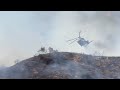 Firefighters battle the Walnut Fire in Burbank