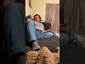 Guy has an accident in his pants while laughing at something on TV!
