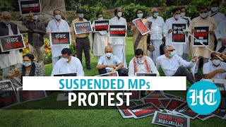 Watch: Suspended MPs protest in front of Gandhi statue in Parliament