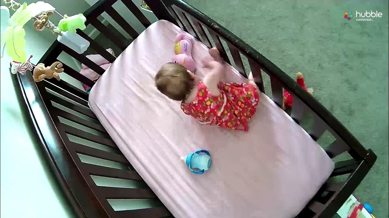Baby pulling herself up in her crib at 11 months old YouTube