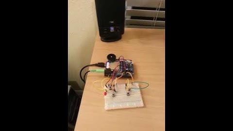 Arduino Freeduino + Adafruit Wave Shield + breadboard with 2 buttons, 1 LED