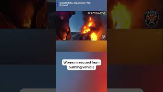 Woman rescued from burning truck