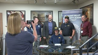 QC student signs for apprenticeship in welding
