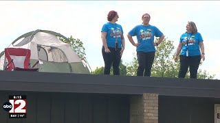 Flushing teachers spend a night camping on their school