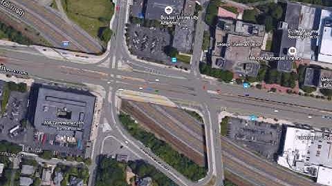 Decentralized optimal control of Connected Automated Vehicles at Urban Intersections