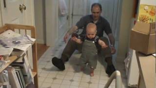 20090806 1051 T almost walking - 10.5 months