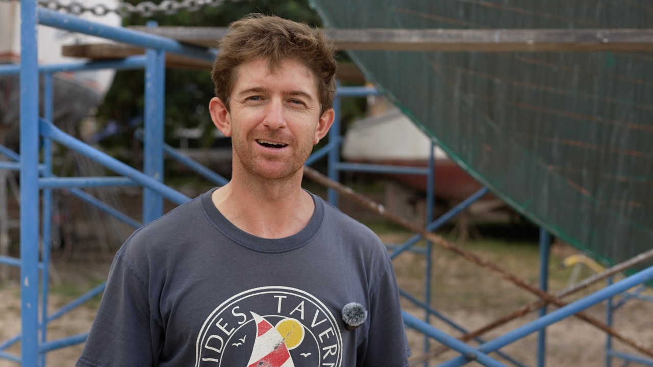 ⁣Tropical boatyard woodwork - repairing planks and painting the boat in a thunderstorm!