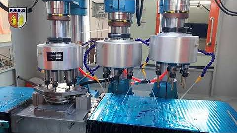 Sliding table type chamfering, drilling and tapping machine