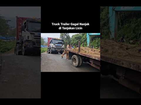 Truk Trailer Ditarik di Tanjakan Licin