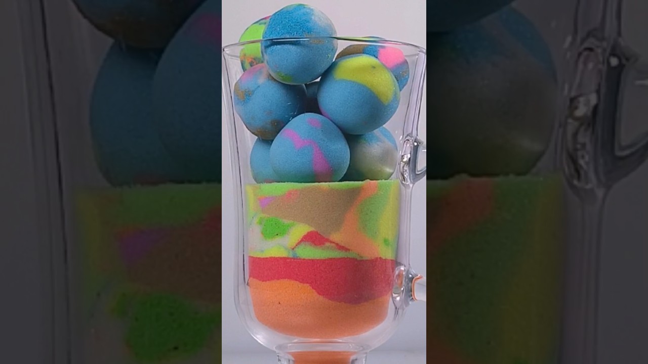 This video shows how to drip, crush, and squeeze kinetic sand in different ways.