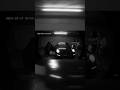 "CCTV Footage: Bear Attempting Car Break-in at Midnight Parking Lot"