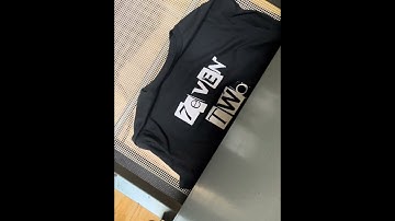 SCREEN PRINTED SHIRTS COMING OUT OF THE DRYER.