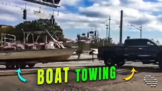 Truck Towing a Boat Smashes through a Crossing