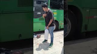 Man Deliberately Falls Backward to Break Ice in Bag