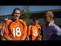 Jon Heath talking to the first fans in line at Broncos training camp