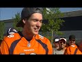 Jon Heath talking to the first fans in line at Broncos training camp