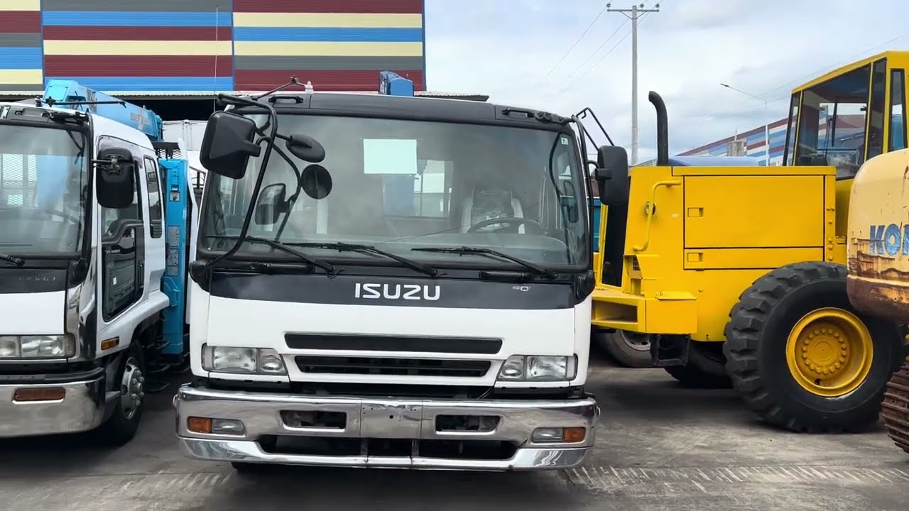 DROPSIDE AND SELFLOADING WITH BOOM ISUZU 6HE1 AT 6HK1 ATING SISILIPIN NG MALAPITAN