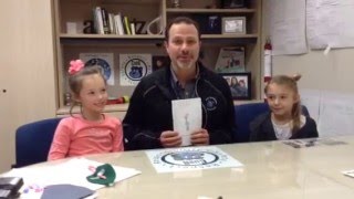 Mr. Russo, Principal of Conant Elementary, Reads a Pattern Book With Students