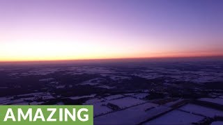 Spectacular winter sunset filmed by high altitude drone at 2,000 feet