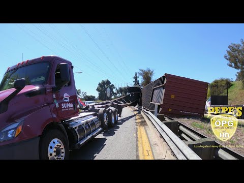 Loaded Container Rolls Over Guardrail