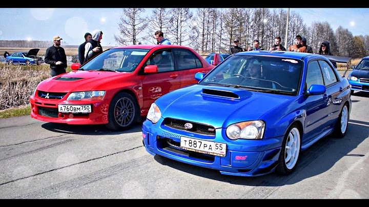 Subaru Impreza WRX STI vs Mitsubishi Lancer EVO 9 - Технолог versus
