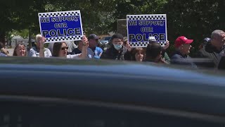 Demonstrators rally in support of police, Anthony Alvarez in clashing protests