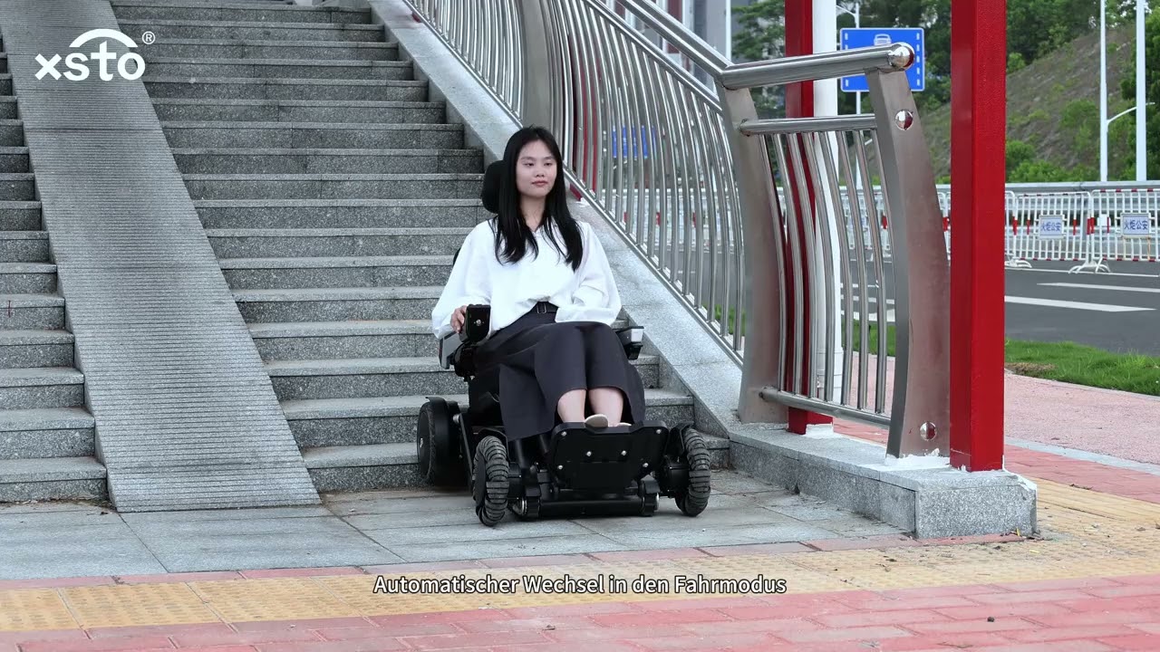 X12 E-Robot: eine Premiere E-Rollstuhl die Treppe hoch und runter fährt. DEUTSCHE BESCHREIBUNG