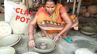 Work skills of village woman.(Pottery Making With Clay)