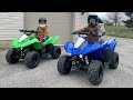 Our Kids get a HUGE SURPRISE! New Kawasaki KFX50 Four-Wheelers for Christmas!