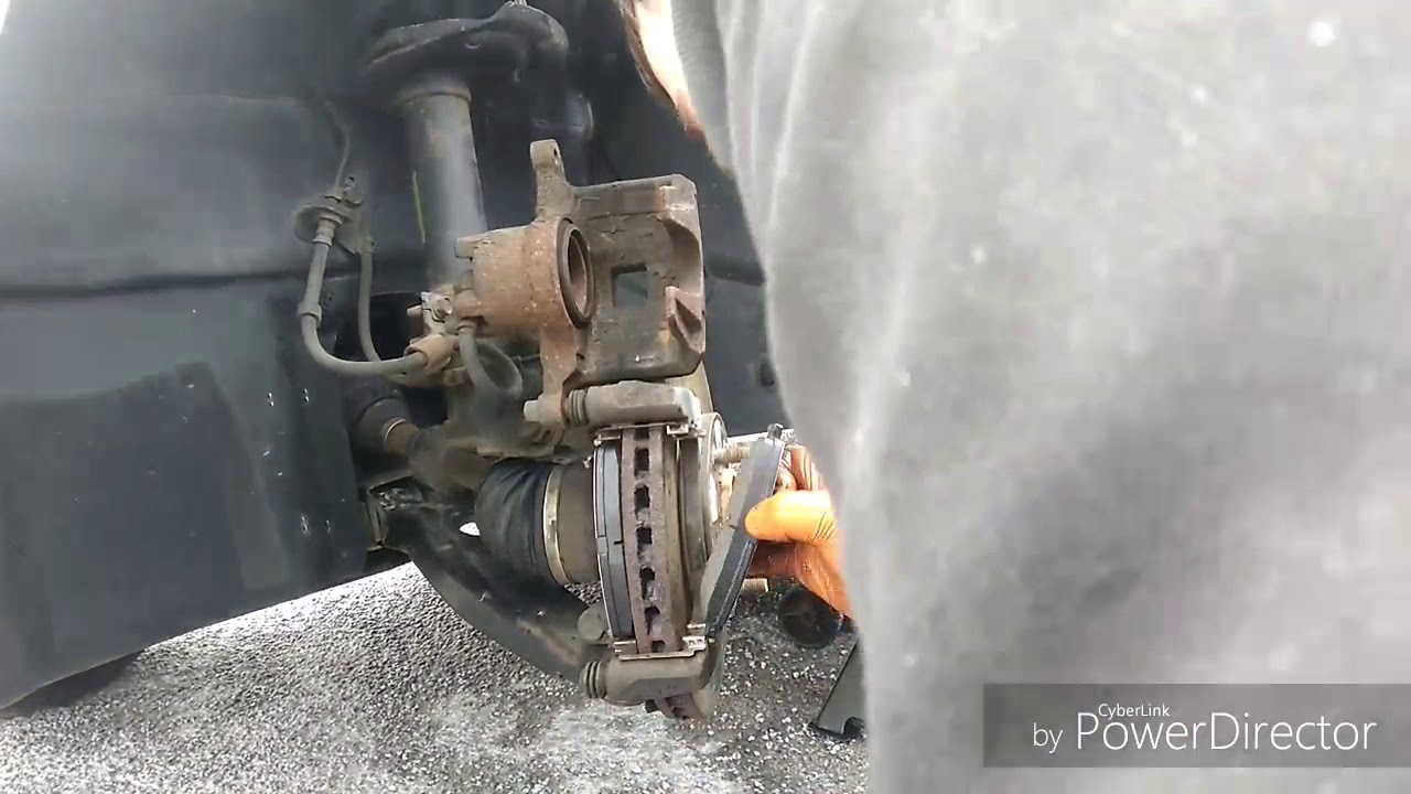 Jeep Patriot front brake pad change (time lapse) YouTube
