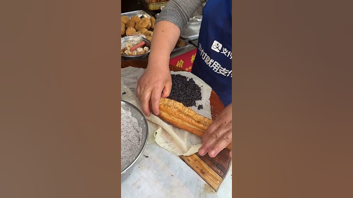 南京的乌饭麻团裹满了3层碳水 吃一个能管一天#街边小吃