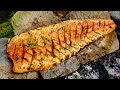 Salmon cooked and smoked over fire a taste you simply havent experienced before