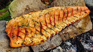 SALMON cooked and smoked over fire. A taste you simply haven't experienced before.