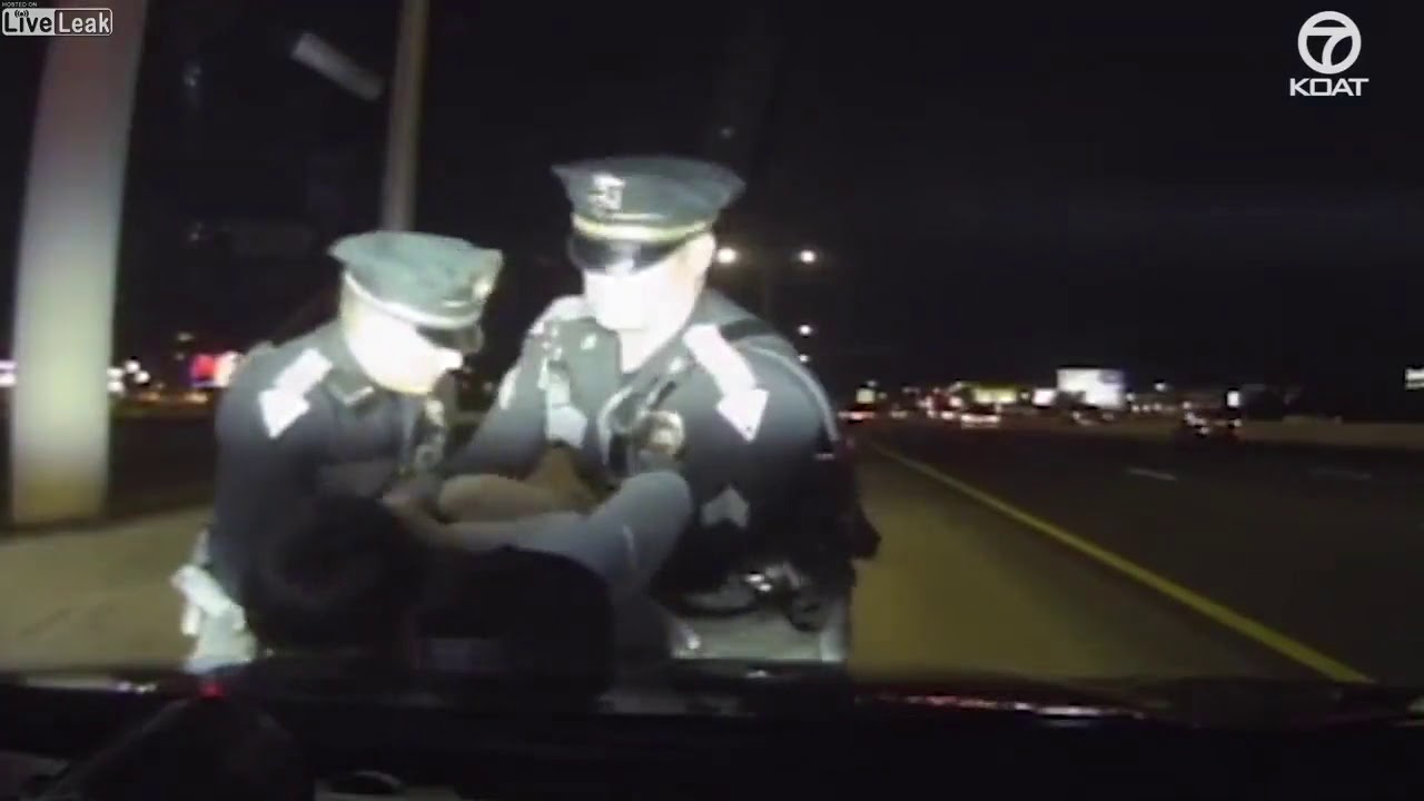 Officer saves drunk driver from running into oncoming traffic - YouTube