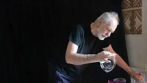 Bare Handed Soap Bubble by Philip Noble