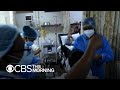 India's record breaking COVID death and infection numbers bring healthcare systems to a standstill - CBS This Morning