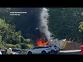 Explosions heard and shops evacuated as van engulfed in flames