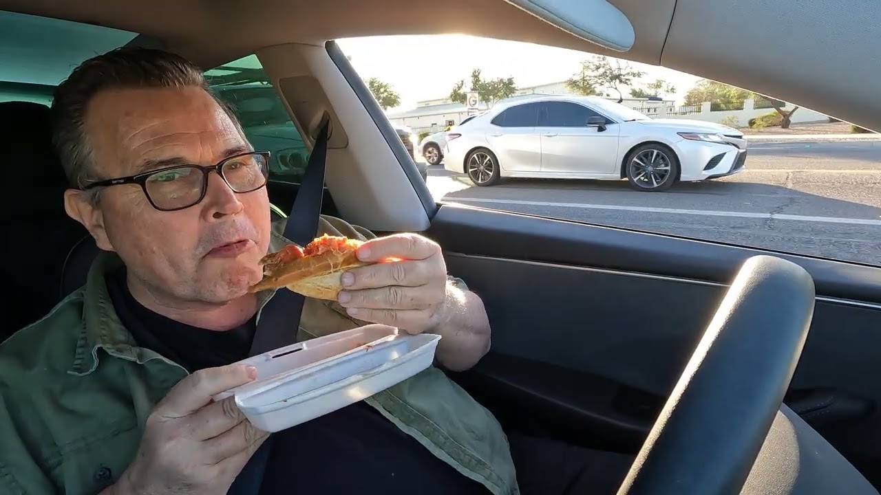 Eating Angie's Lobster Seasoned Lemon Butter Lobster Roll driving through Glendale, Arizona NGH20007