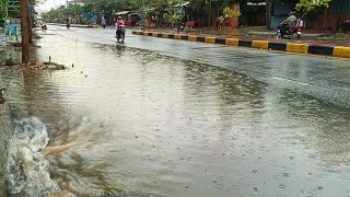 Remove Trash And Plastic Clogged Culvert Drain Water On Street Road