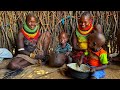 African traditional  village  life  never  shown on tv eating on utensils  made from wood