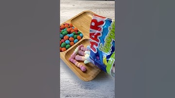 Filling platter with Candy #asmrsounds #asmr #nerds #nerdscandy #viralvideo #shorts #tiktokvideo