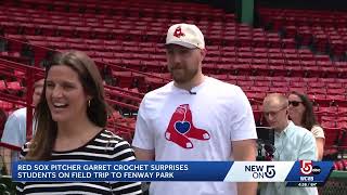 Boston students surprised by Red Sox pitcher during Fenway Park tour