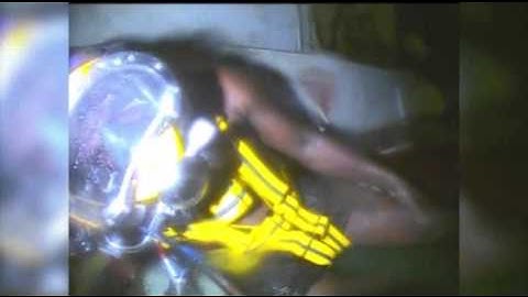 Raw: Divers Find Man Alive in Sunken Tugboat