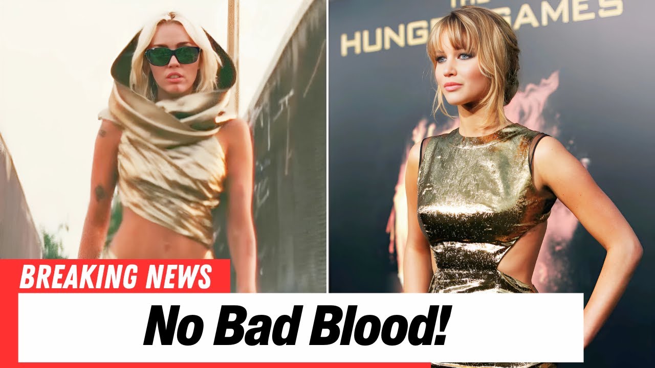 miley and jennifer lawrence gold dress Gold Foil Print Mini Wrap Dress with Slit in Navy and Gold main image 1