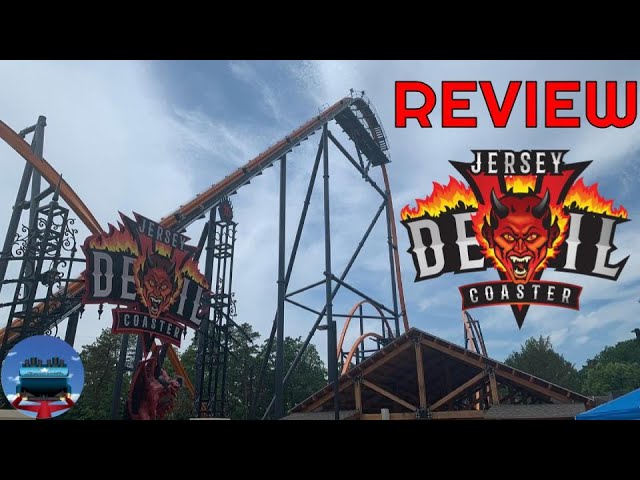 Jersey Devil Coaster, Six Flags Great Adventure], valleyed during a test  run. Visible from Nitro's lift hill is one of the Jersey Devil Coaster  trains valleyed in the dip before the mid-course