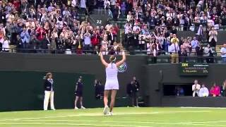 Alize Cornet of France celebrates beating Serena Williams of the