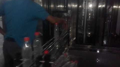 Máy chiết rót chai nước suối, chiết rót nước mắm tự động.  0909618949