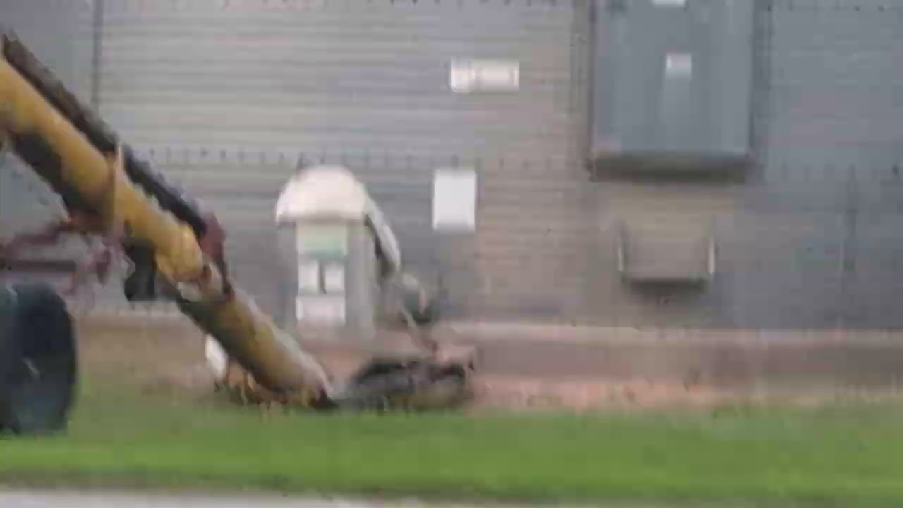 Blower fans on grain storage buildings.