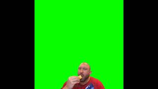 man eating chips with green screen (not full)