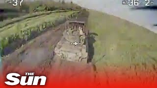 Ukrainian forces blow up Russian vehicle with makeshift drones screenshot 2
